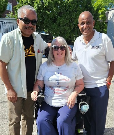 RAMPING UP ACCESSIBILITY:  RAMP CEO Tina Guenette Pedersen with Tomas Avila, Associate Director RI DEDI and James Vincent, President NAACP Providence at the Pawtucket Heritage Festival (Photo courtesy of rampisinclusion.org)